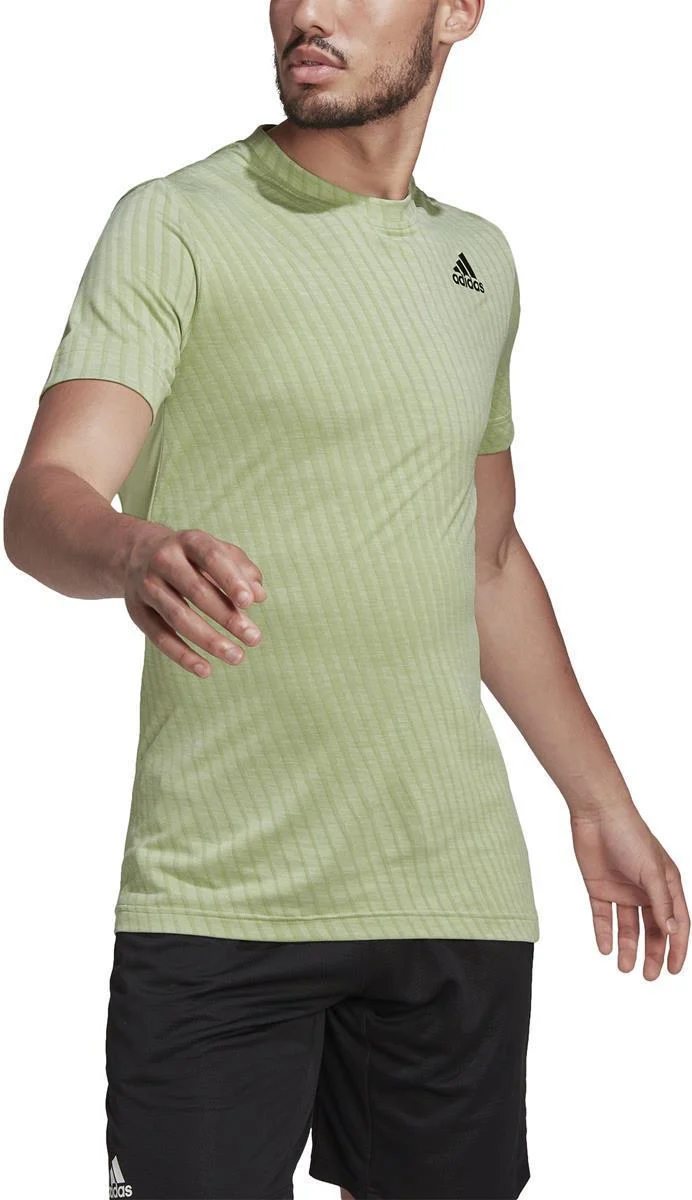 T FREELIFT TEE. Tennisshirt